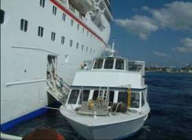 cruise ship anchored of koh samui loading passengers on to tender ready to take cruise ship shore excursion